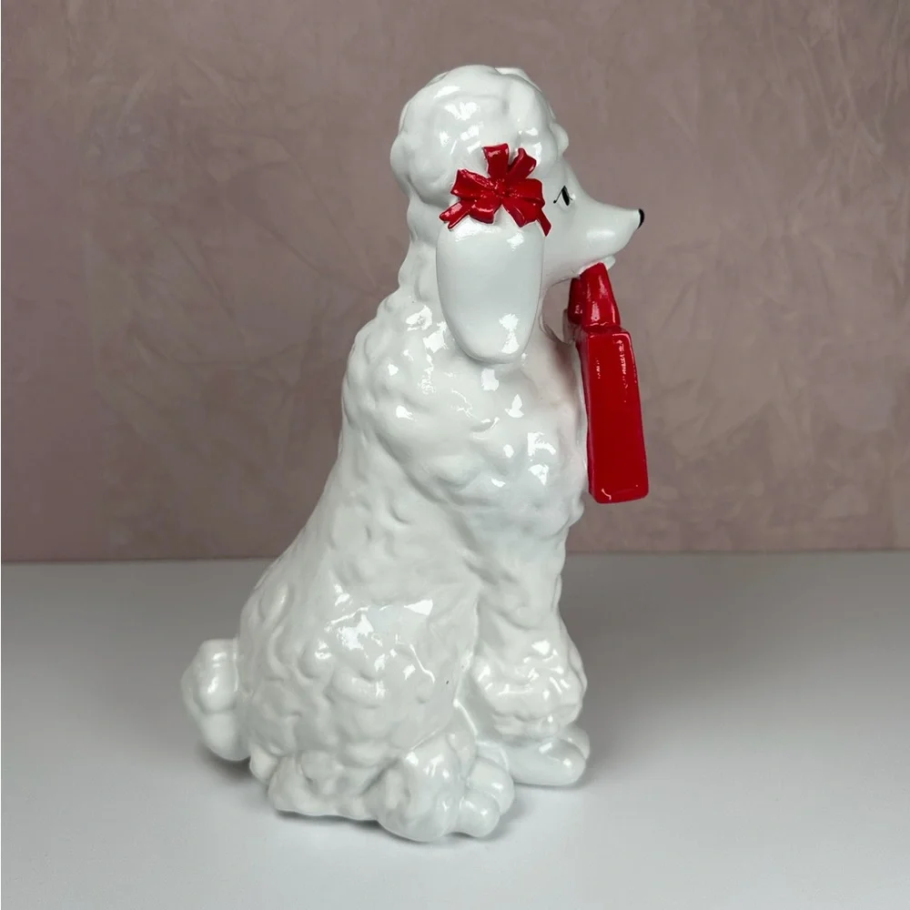 HomeGoods White Poodle Figurine with Red HomeGoods Bag